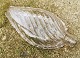 Clear glass 
pocket bottle 
flask from 
around 1900. 
Optically 
twisted and 
decoration on 
the ...