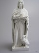 Royal 
Copenhagen 
Bisquit, 
Apostlen 
Johannes med 
Ørnen, efter 
model af Bertel 
Thorvaldsen H: 
32 cm