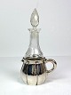 Jug with 
crystal glass, 
and of 
three-tower 
silver. 
Intended for 
oil and 
vinegar. 
Stamped H-CF 
...