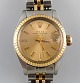 Rolex Oyster 
Lady Perpetual 
Gold Date. 
Damearmbåndsur, 
original lænke 
i stål og 18 
karat guld. ...