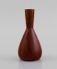 Carl Harry 
Stålhane 
(1920-1990) for 
Rörstrand. Vase 
i glaseret 
keramik. Smuk 
glasur i 
rødbrune ...