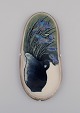 Heljä 
Liukko-
Sundström (b. 
1938) for 
Arabia. Glazed 
faience wall 
plaque with 
hand-painted 
...