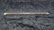 Elegant Bismark 
Armbånd  14 
karat Guld
Stemplet AUR 
585
Længde 18,5 cm
Brede 7,34 ...