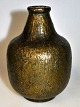 Støbt bronze 
vase, ca. 1900 
- 1920. Med 
støbt mønster. 
Ustemplet. H.: 
12,5 cm. 