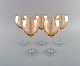 Skandinavisk glaskunstner. Fem store rødvinsglas i kunstglas. 1980'erne.Måler: 20,5 x 7 cm.I ...