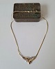 Vintage collier i 14 kt guld med zirkoner Stemplet 585Længde 42 cm.