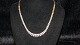 14 carat Brick, 
necklace with 5 
rows of 
chisellings and 
reverse chain.
Stamped PCL 
585
Length ...