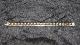 Elegant armbånd i 14 karat GuldStemplet WO 585Længde 19,5 cmBrede 10,89 mmTykkelse 2,31 ...