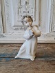 Lladro figur i 
form af 
englebarn der 
spiller fløjte
Højde 16 cm.