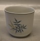 1 pcs in stock
219 Vase 7 cm 
(676) APOLLO: 
White base, 
blue and 
gold/green 
grass leaves, 
form ...