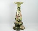 Faience 
pedestal / 
flower 
arrangement 
decorated with 
flowers in 
shades of green 
with beautiful 
...
