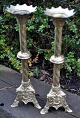 A pair of 
French 
candlesticks in 
cast bronze and 
brass, ...