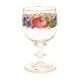 An enamel decorated wine glass. Circa 1860. H: 12cm