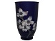 Royal 
Copenhagen dark 
blue vase with 
flowers.
The factory 
mark tells, 
that this was 
produced ...