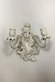 Tysk to-armet 
væglampet i 
Porcelæn. Små 
afslag på 
blomster etc.
Måler 21 cm x 
17 cm (8.27 in. 
...