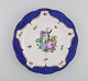 Herend 
middagstallerken 
i håndmalet 
porcelæn. 
Dateret 1941. 
Diameter: 27,3 
cm.
I flot ...