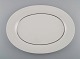 Tapio Wirkkala 
for Rosenthal. 
Sjældent 
Modulation 
serveringsfad i 
riflet 
porcelæn. 
Platinum ...