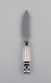 Georg Jensen Acorn cheese knife in sterling silver and stainless steel.
