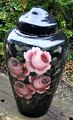 Large glass lid 
jar with back 
glass painting, 
20th ...