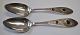A pair of 
antique silver 
spoons with red 
glas stones, 
...