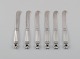 Six Georg 
Jensen Acorn 
butter knives 
in sterling 
silver.
Length: 15 cm.
In excellent 
...