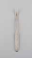 Early Georg 
Jensen Rope 
cold meat fork 
in silver 
(830). Dated 
1915-1930.
Length: 18.3 
cm.
In ...