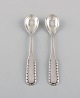 Two early Georg 
Jensen Rope 
salt spoons in 
silver (830). 
Dated 
1909-1914.
Length: 9 cm.
In ...