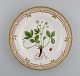 Royal Copenhagen Flora Danica dinner plate in hand-painted porcelain with 
flowers and gold decoration. Model number 20/3549.
