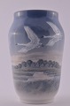 Royal 
Copenhagen 
porcelain. Vase 
decorated with 
swans, no. 
1955-1217. 
height 25.5 cm. 
10 inches. ...