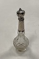 Perfume bottle 
in glass with 
silver mounting 
19th century.