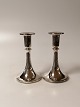 A pair of 
silver 
candlesticks of 
830s Height 
13.5cm.