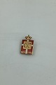 Georg Jensen 14 
Kt Guld 
Kongemærke, 
Herre 1940
Måler  1.4 cm 
x 2.4 cm(0 
35/64 in x 0 
15/16 in) ...