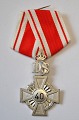 Det Danske Spejderkorps 40 års medalje med ordensbånd, 20. årh. 4,8 x 3,2 cm. 