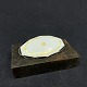 Længde 5,5 cm.
Stemplet med 
en lille blomst 
og 925S for 
sterlingsølv.
Oval broche 
med hvid ...