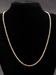 18 karat guld 
anker halskæde 
46 cm. B 0,25 
cm. vægt 12,3 
gram emne nr. 
496752
