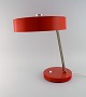 Stor justerbar 
skrivebordslampe 
i original rød 
lak. 1970'erne.
Højde: 43 cm.
Fod diameter: 
20 ...