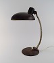 Justerbar 
skrivebordslampe.
 Industrielt 
design, midt 
1900-tallet.
Højde: 43 cm.
Fod diameter: 
...