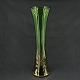 Højde 34,5 cm.Slank vase i grønt glas fra Holmegaard Glasværk.Vasen er fra 1950-1960'erne ...