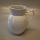 1 stk på lager
440-1 Kande, 
12 cm, 38 cl  
 Royal 
Copenhagen Hvid 
riflet .  I fin 
og hel ...