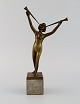 Art deco 
bronzeskulptur 
på marmorbase. 
lurblæsende 
nøgen kvinde. 
1920/30'erne.
Måler: 30 x 15 
...