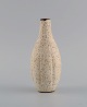 Körting, Germany. Unique vase in glazed stoneware. Beautiful speckled glaze in 
sand shades. Mid-20th century.
