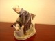 Royal 
Copenhagen 
figurine, Girl 
with a calf. 
Decoration 
number 779  
Factory ...