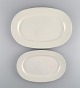 Raija 
Uosikkinen for 
Arabia. Two 
Pitsi serving 
dishes with 
flower 
decoration. 
Dated ...