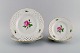 Four Meissen 
Pink Rose 
plates in 
openwork 
porcelain with 
hand-painted 
roses and gold 
edge. Early ...