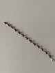 Elegant Armbånd 
med røde perler 
i sølv
Stemplet 925 S
Længde 18,5 cm
Pæn og 
velholdt stand
