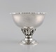 Georg Jensen 
"Louvre" opsats 
i sterlingsølv. 
Art nouveau 
stil med 
naturens 
organiske 
former og ...