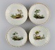 Fire antikke Royal Copenhagen porcelænsskåle med håndmalede landskaber og gulddekoration. ...