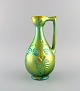 Zsolnay kande i glaseret keramik modelleret med bladværk. Smuk eosinglasur. 1960'erne.Måler: ...