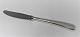 Michelsen. Ida. 
Middagskniv. 
Design: Ole 
Hagen. Sterling 
(925). Længde 
23,5 cm.