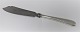 Michelsen. Ida. 
kagekniv. 
Design: Ole 
Hagen. Sterling 
(925). Længde 
29,5 cm.